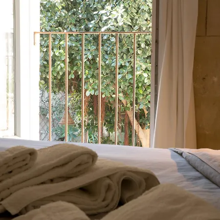 Ortigia Lägenhetshotell 4*