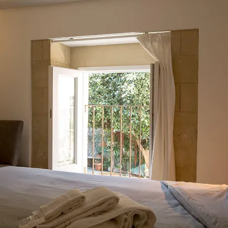 Ortigia Lägenhetshotell 4*